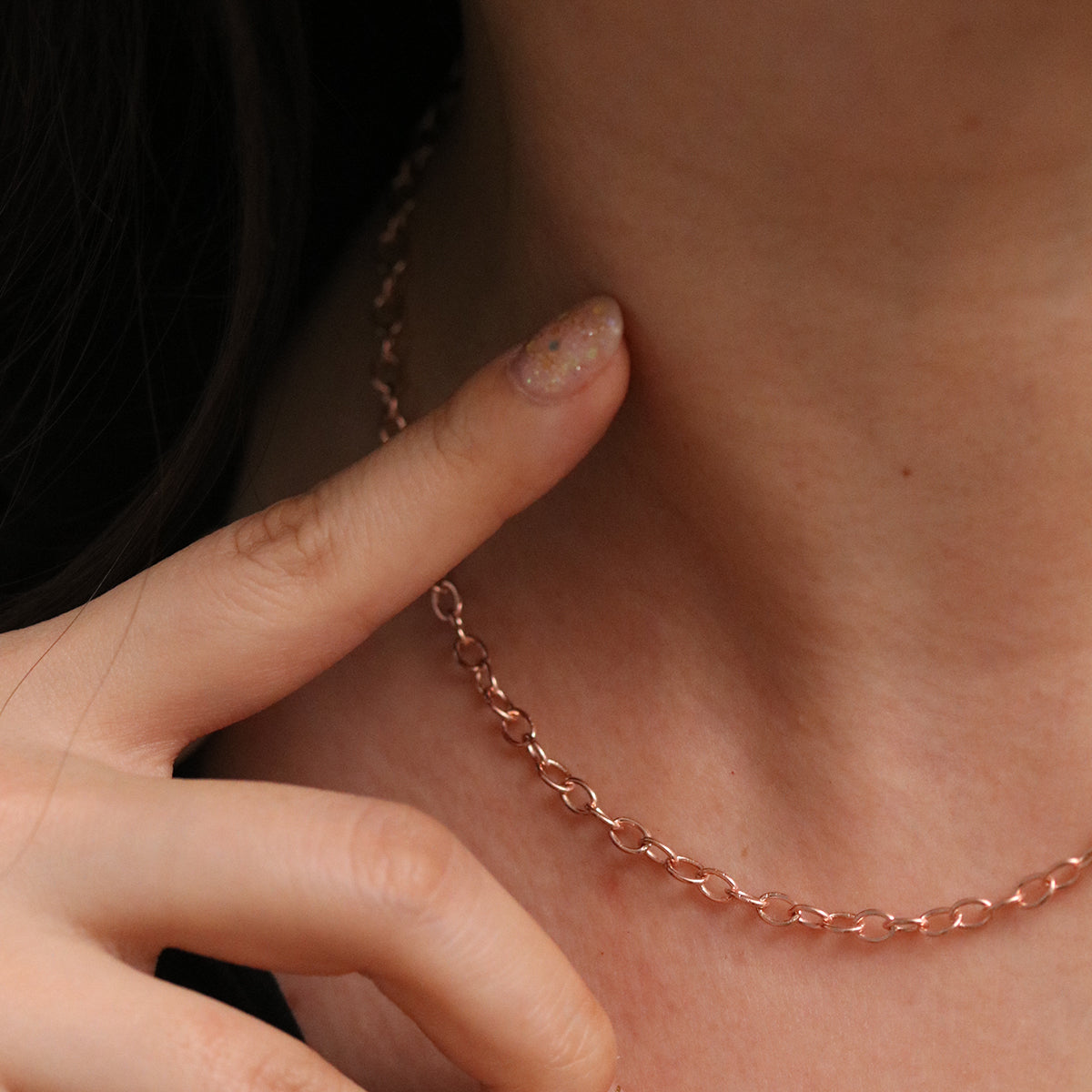 Stylish medium oval chain necklace with smooth, elongated oval links, offering a balanced and elegant design with a polished finish.