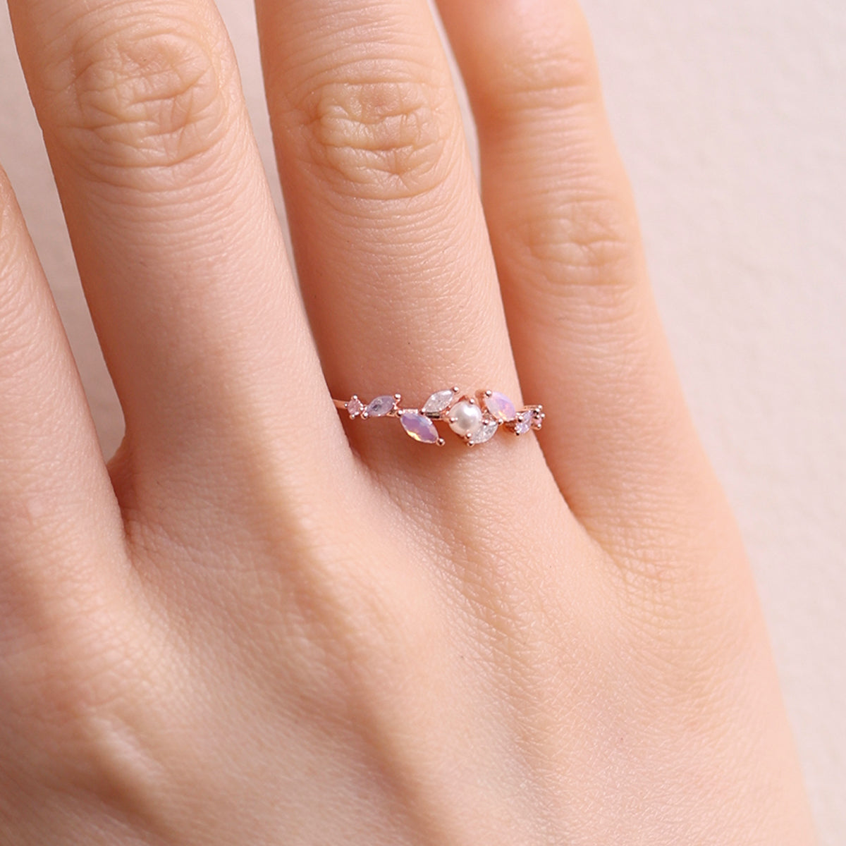 Moonstone Cubic Pearl Vine Ring featuring a delicate vine design with shimmering moonstone and lustrous cubic pearls, crafted for timeless elegance and sophistication.