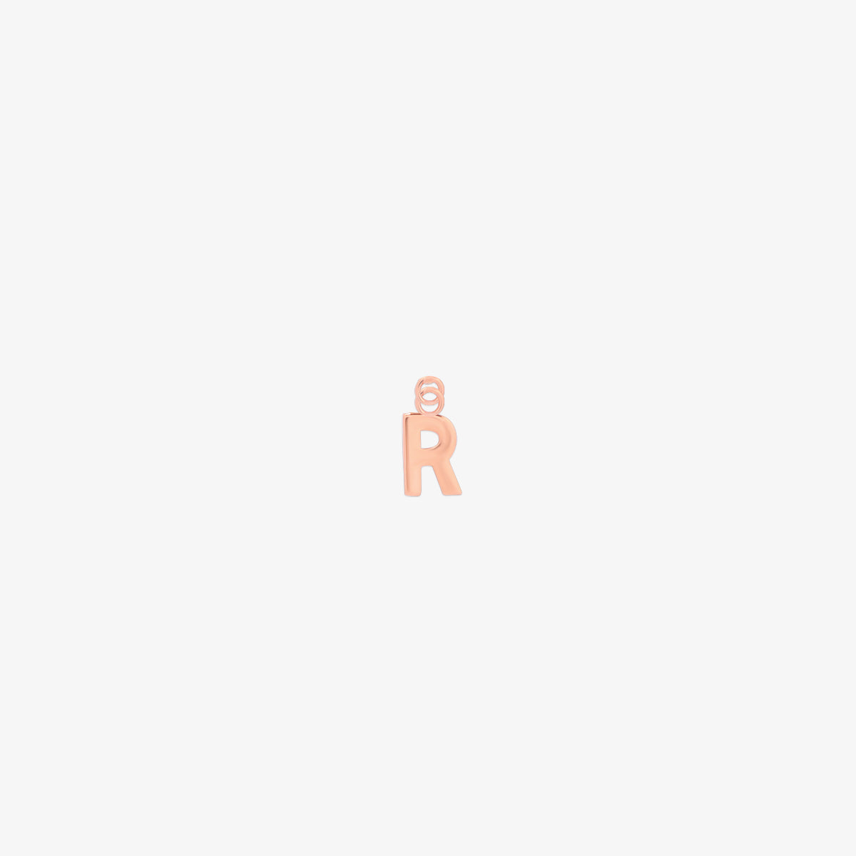 Classic rose gold initial pendant charm with a smooth, polished surface and elegant serif lettering.