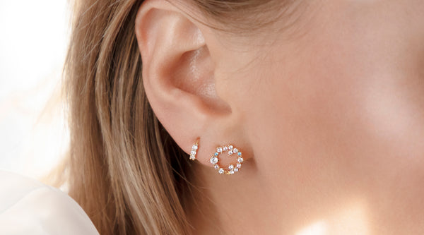 woman wearing a stud earring