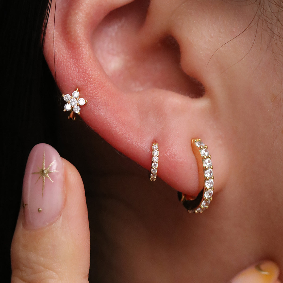 Dainty cubic flower huggie earring