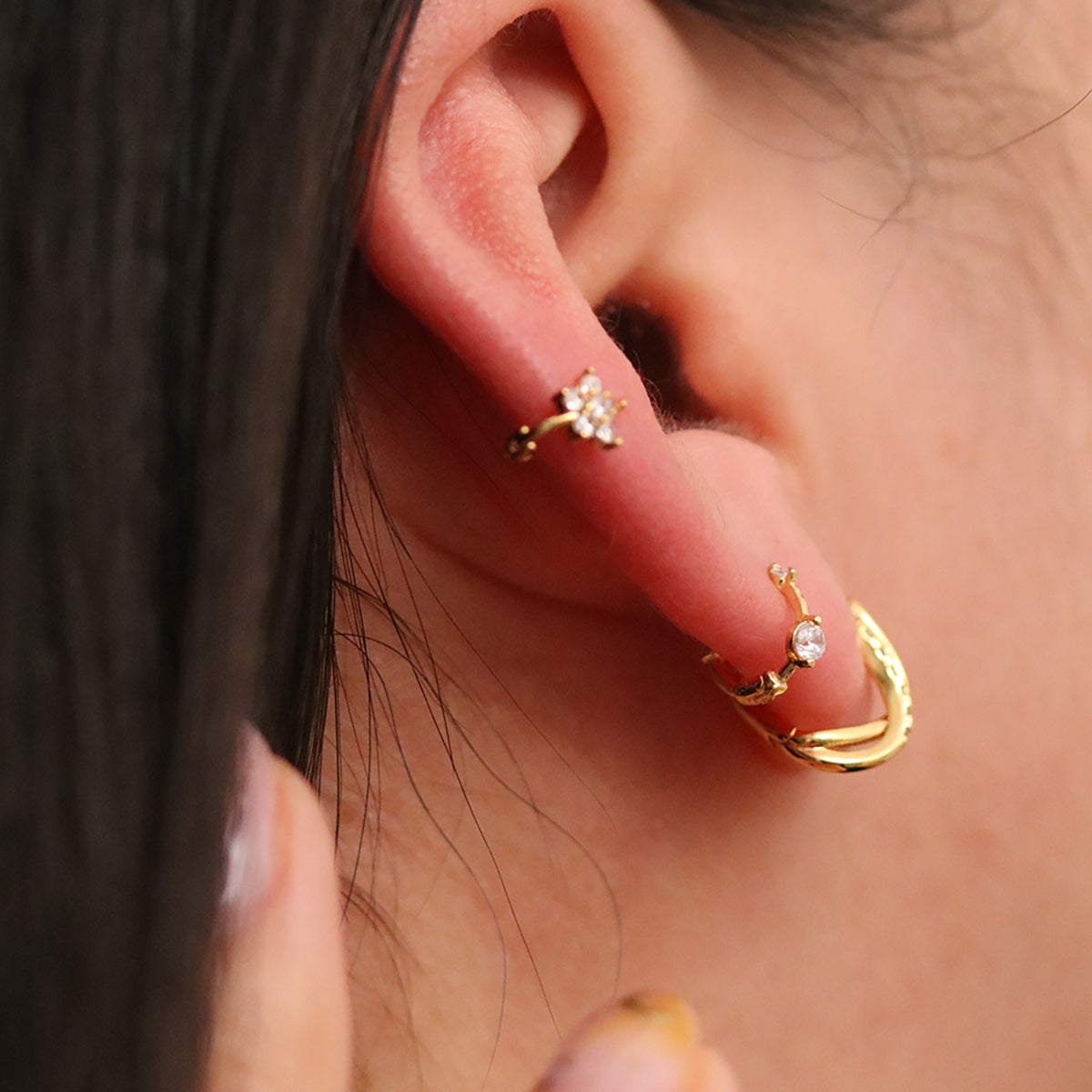 Dainty cubic flower huggie earring