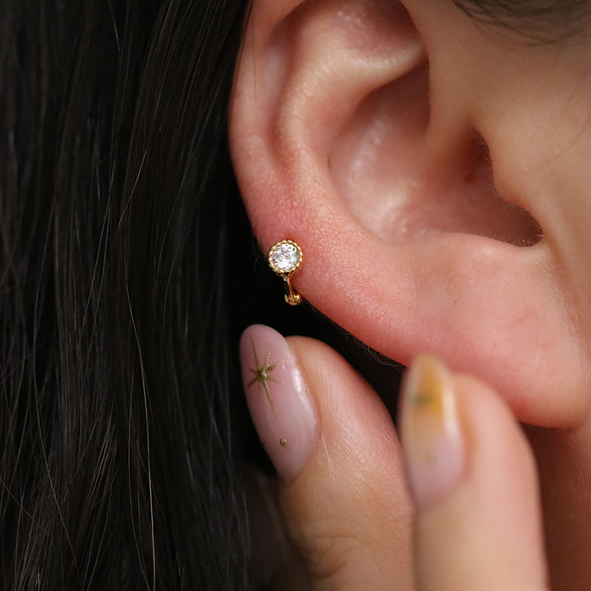 Single cubic huggie earring