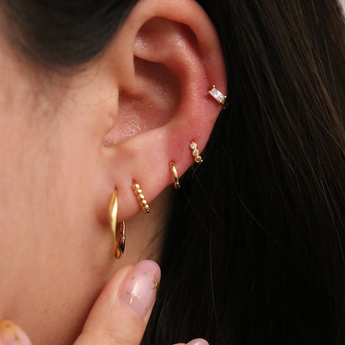 Dotted huggie earring