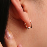 Heart silhouette huggie earrings