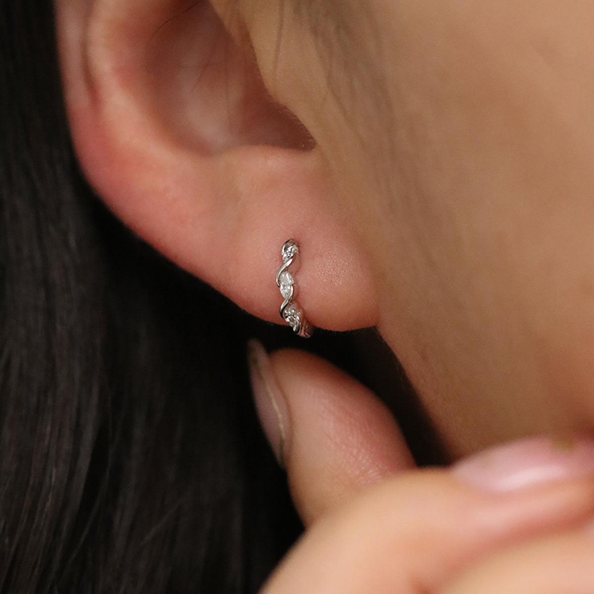 White Topaz Twirl Huggie Earrings