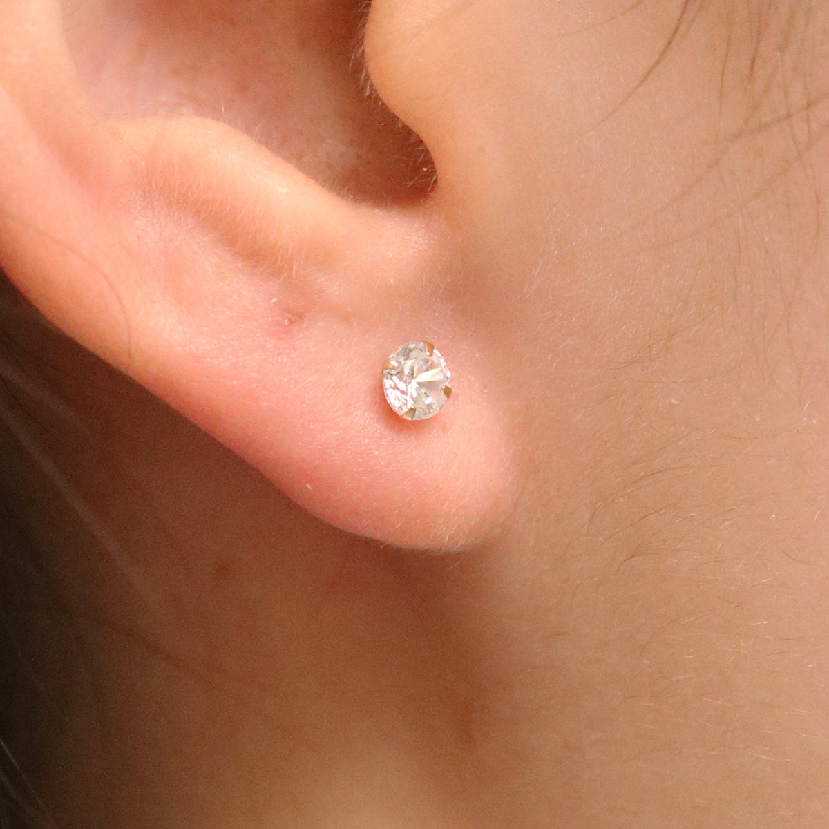 Four prong White Topaz studs