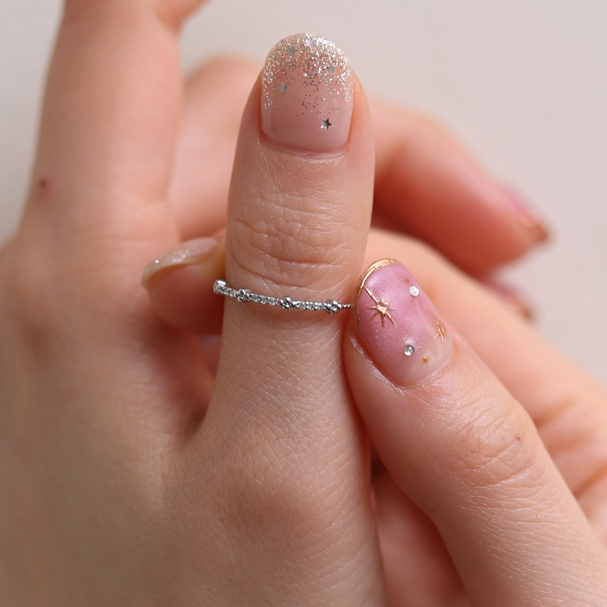 Simple Line Cubic Ring featuring a minimalist band with a single cubic zirconia, offering a sleek and elegant touch to any outfit.