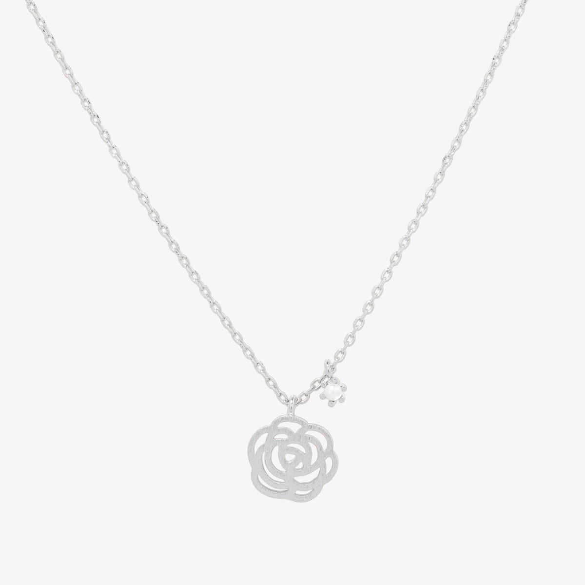 Line rose with pearl necklace