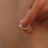 Cubic cross huggie earring