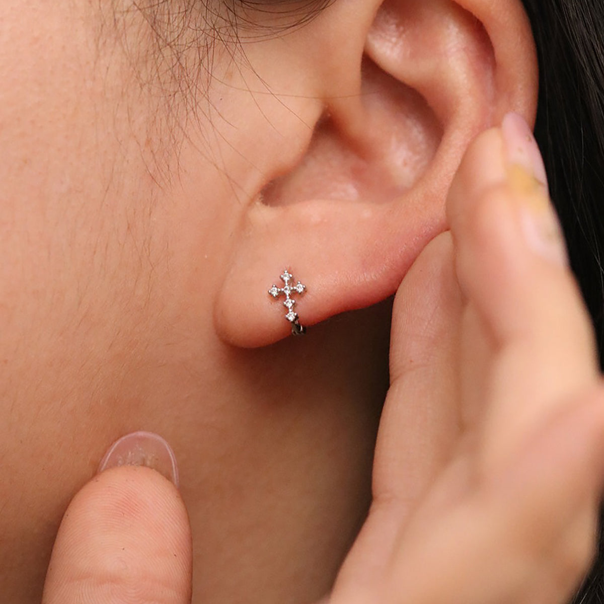 Cubic cross huggie earring