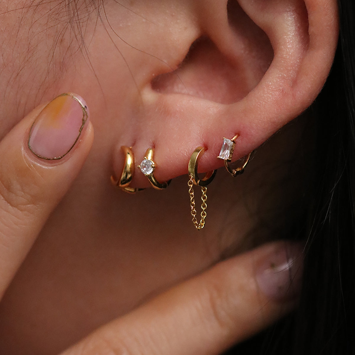 Crescent huggie earrings