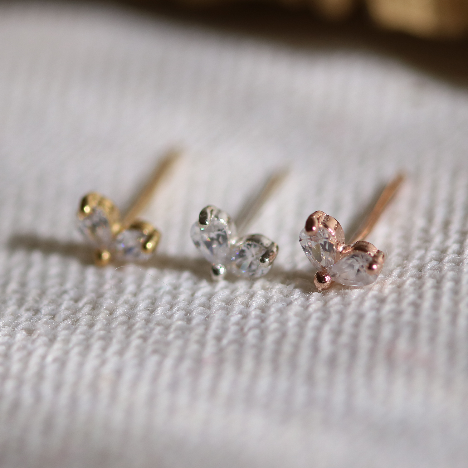 Tiny leaf stud earrings