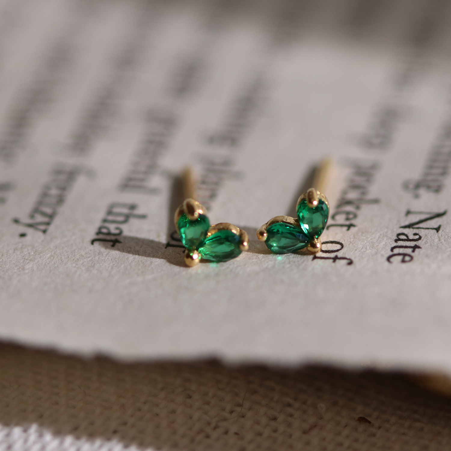 Tiny green leaf stud earrings