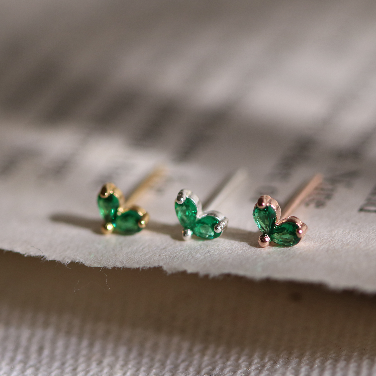 Tiny green leaf stud earrings