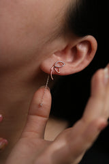Angled knot drop earrings
